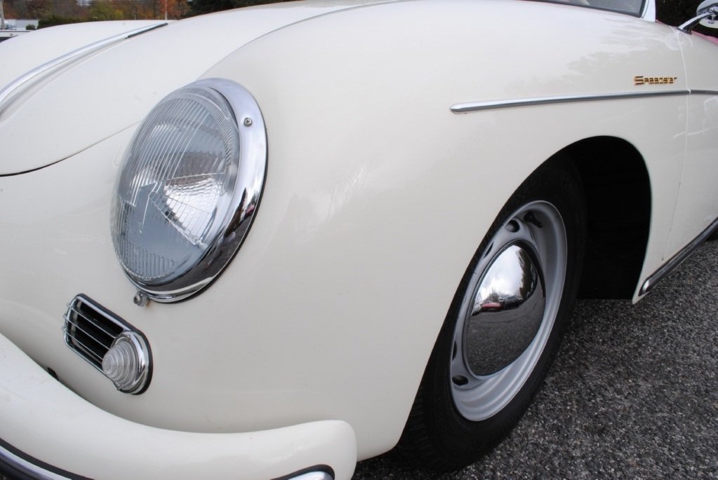 Own a classic 1957 Porsche 356A Speedster, restored to perfection with rebuilt motor, red leather seats, and original Speedster White paint, ideal for collectors.